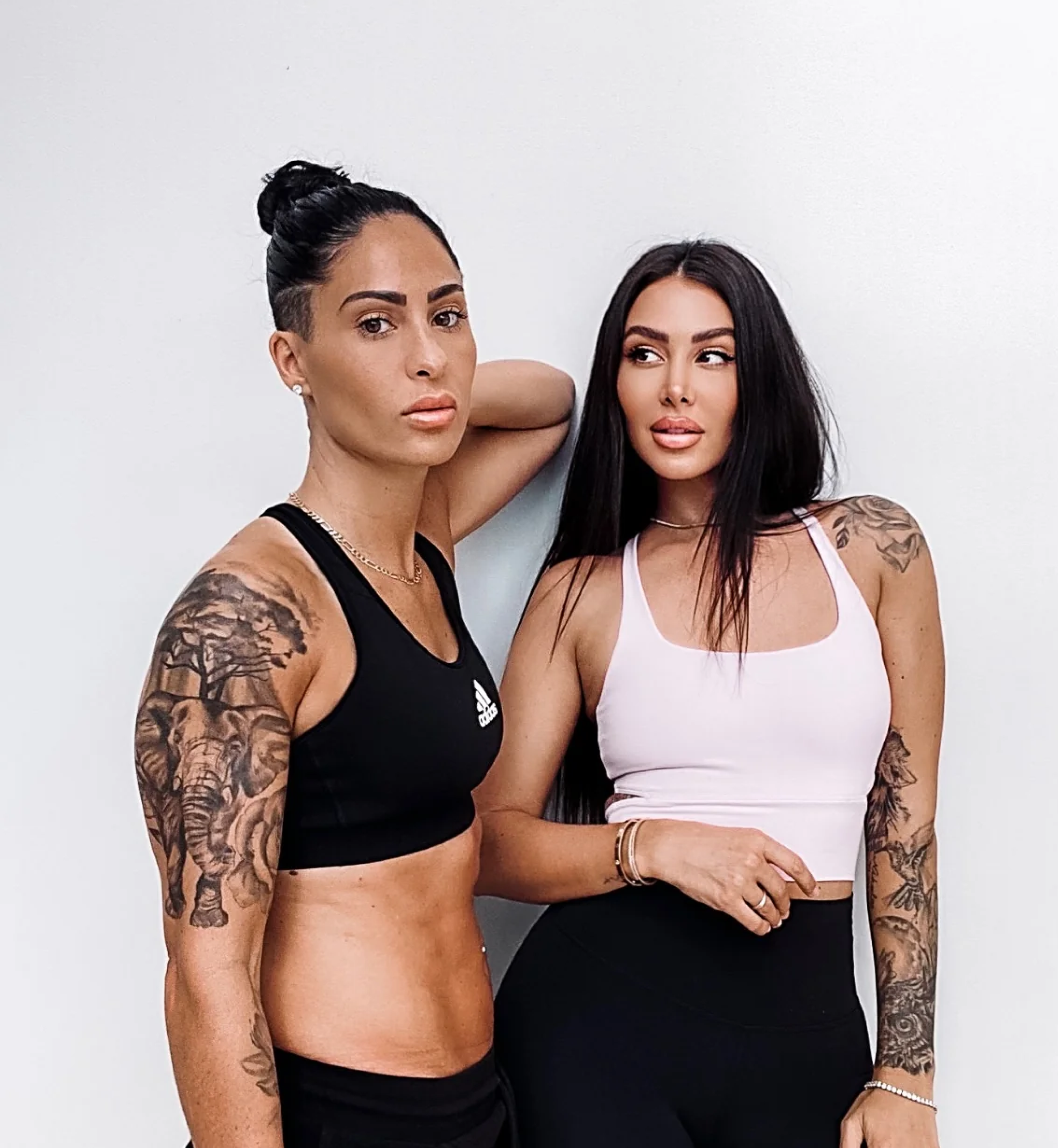 Girlfriend couple modeling together