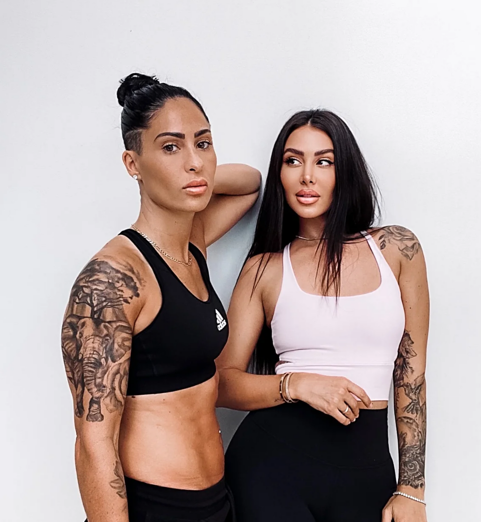 Girlfriend couple modeling together