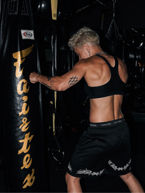 Morgan hitting a punching bag
